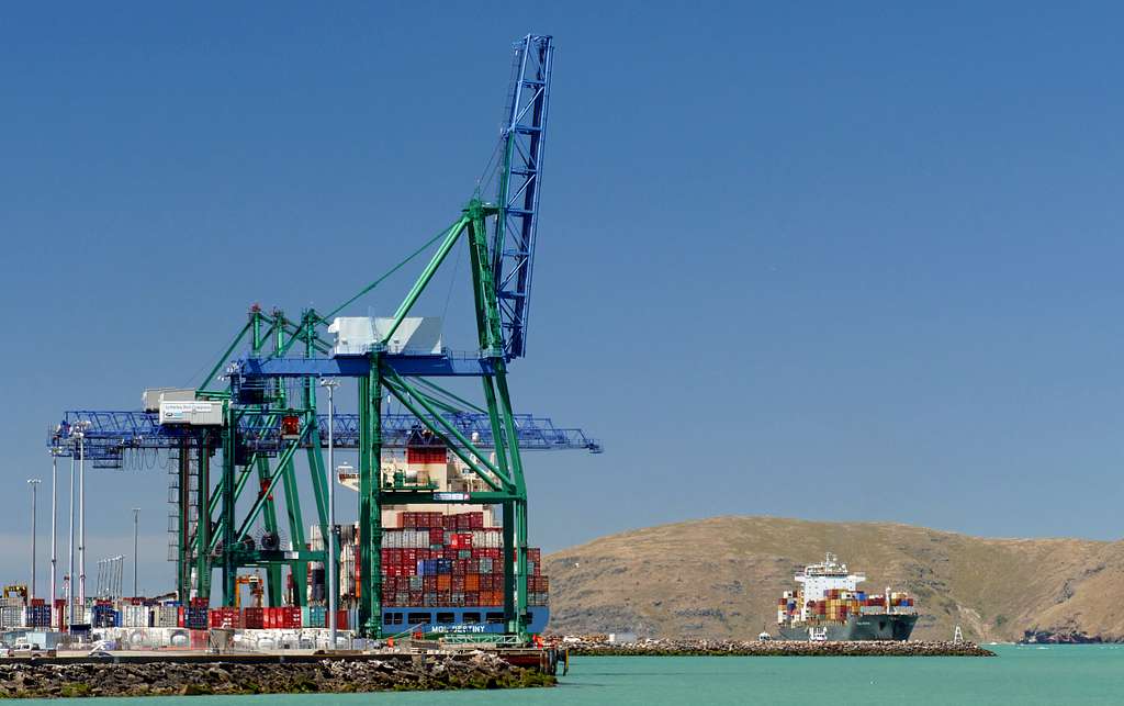 Image of a Lyttleton commercial port featuring a containership and crains.