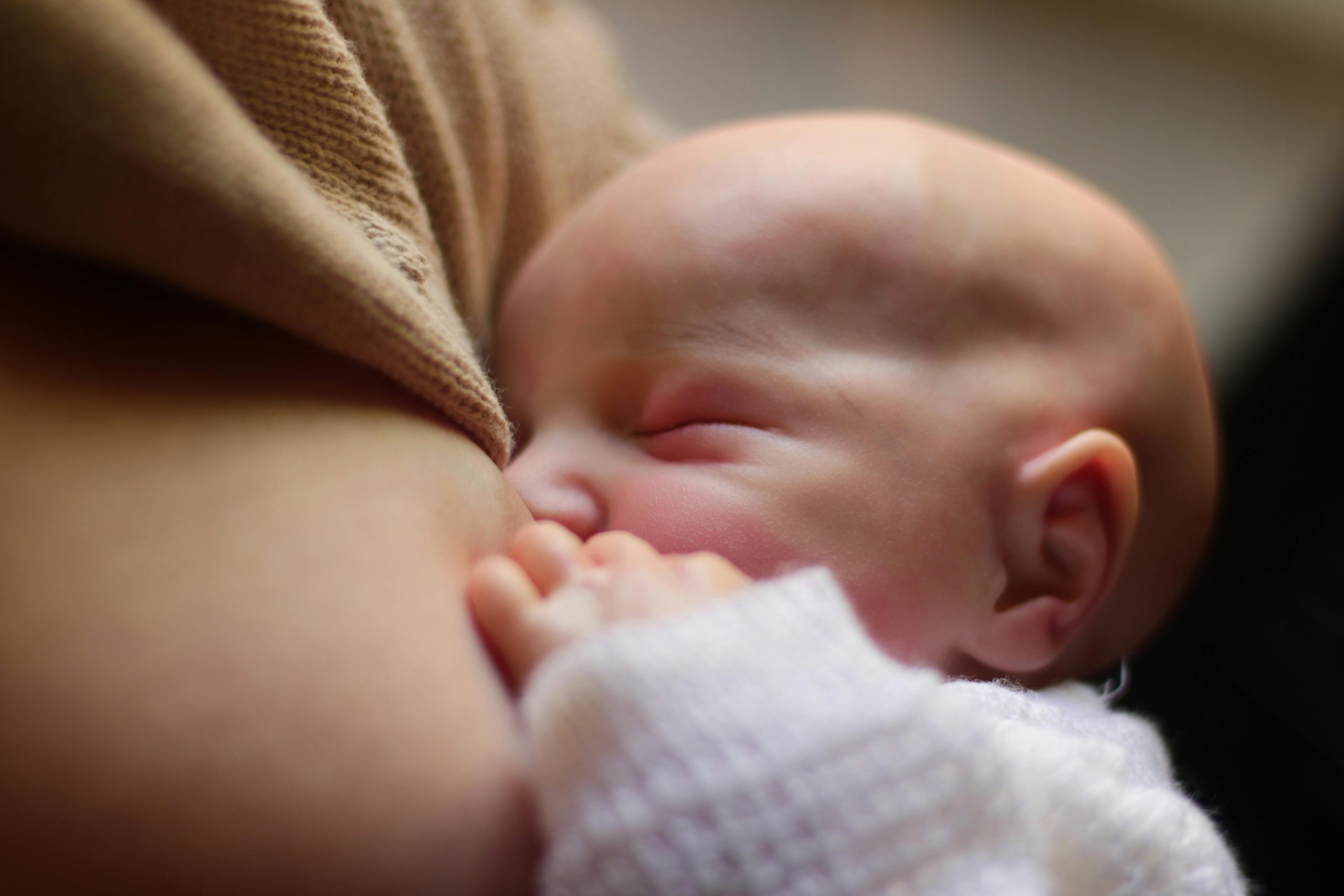 Image of infant breastfeeding
