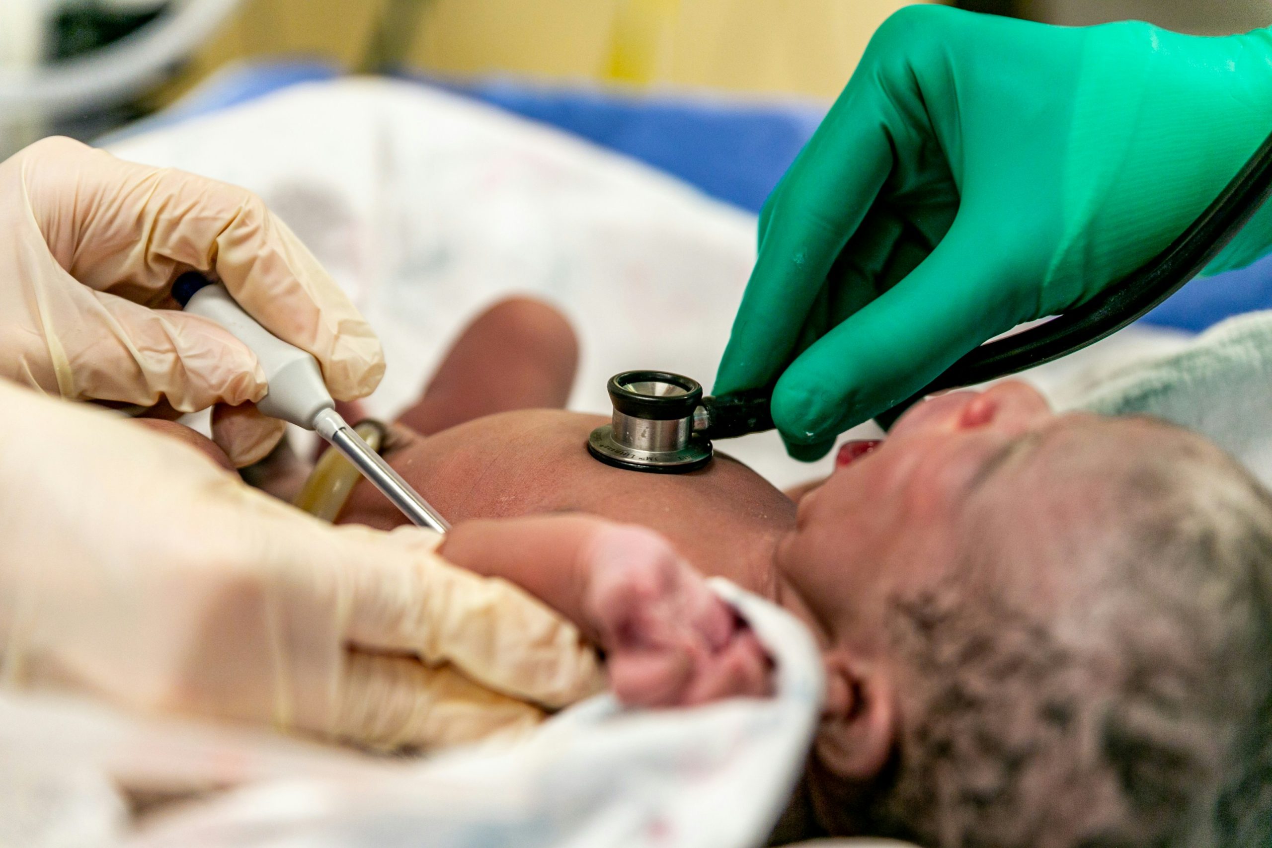 Newborn Baby Having Lungs and body temperature checked