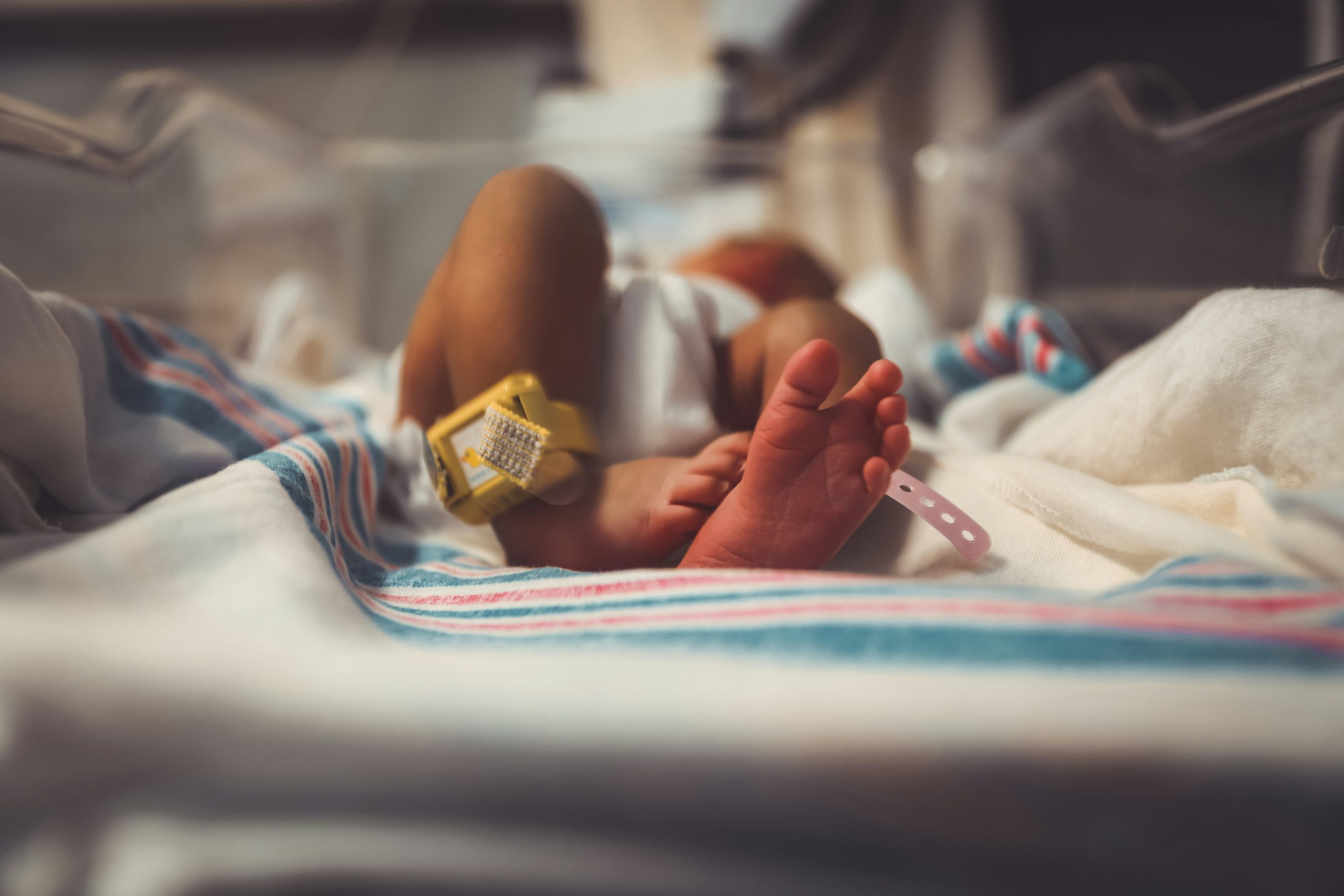 Image of baby lying on a bed