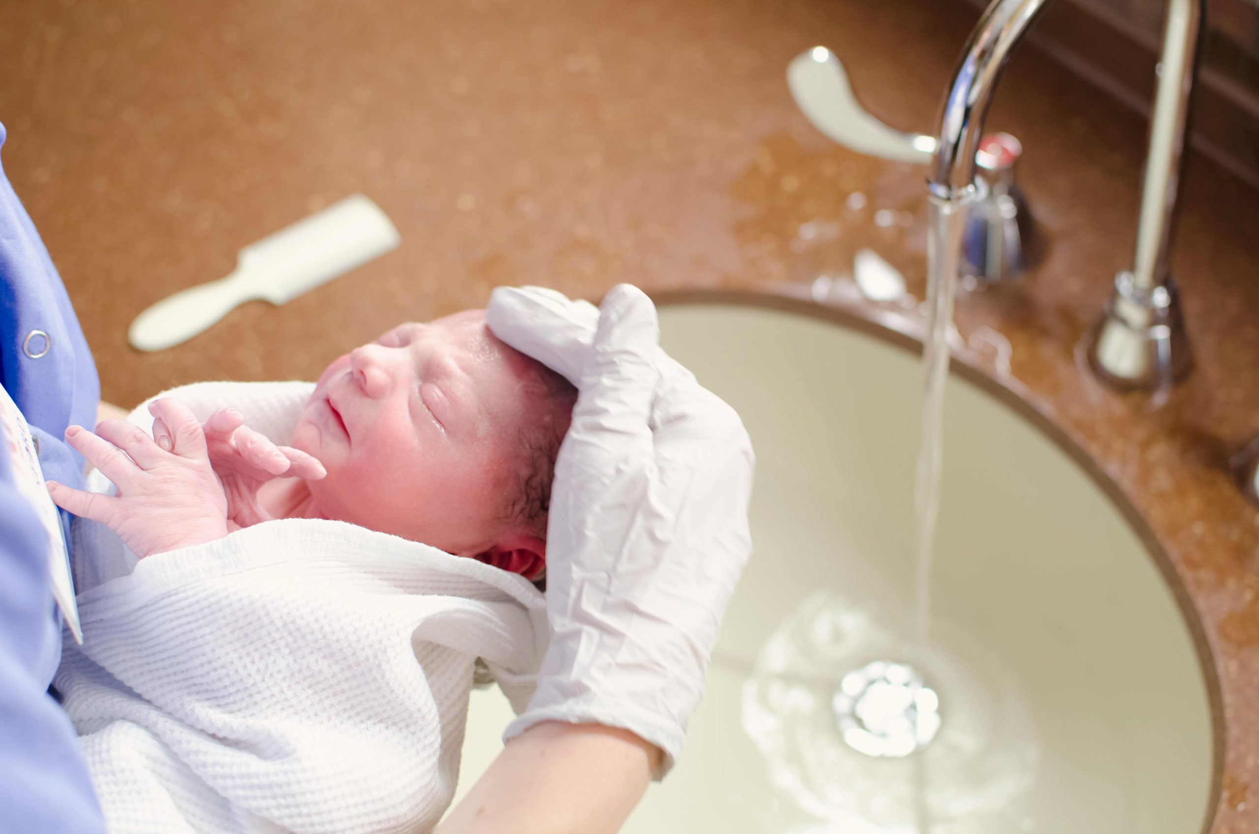 Image of nurse with infant
