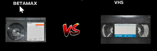 Betamas vs VHS, both types of tape with the vs written in a streetfighter font