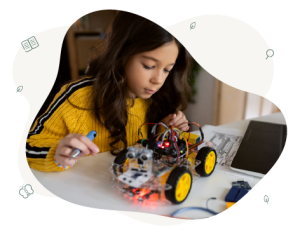 Female child working on a mechanical robotic car