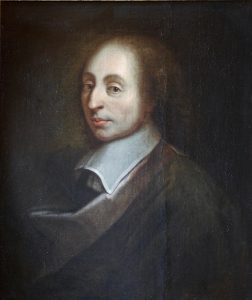 Copy of an oil painting of Pascal with a dark background. Pascal has pale skin and brown or dark hair. Details of the painting beyond his face and large white collar merge into the dark background.