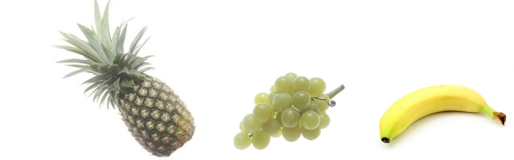 A picture of three fruit in a row on a white background. Close-up photograph of a whole, ripe pineapple. Close-up photograph of a bunch of green grapes. A single ripe banana photographed against a plain white background.