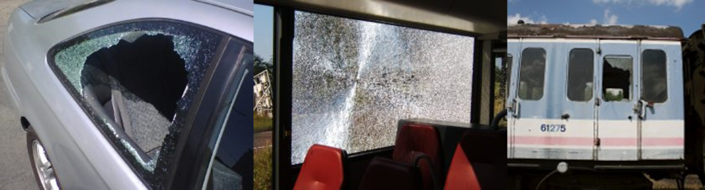 Three images in a row show, one, a broken car window as a result of a burglary, the glass is smashed and a large hole created; two, a large bus window has been shattered but has held together due to being safety glass; three, an old commuter train sits on tracks with a smashed window and hole.